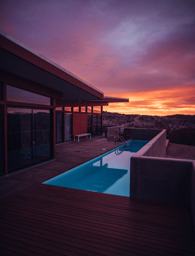 Luxury villa with pool at sunset